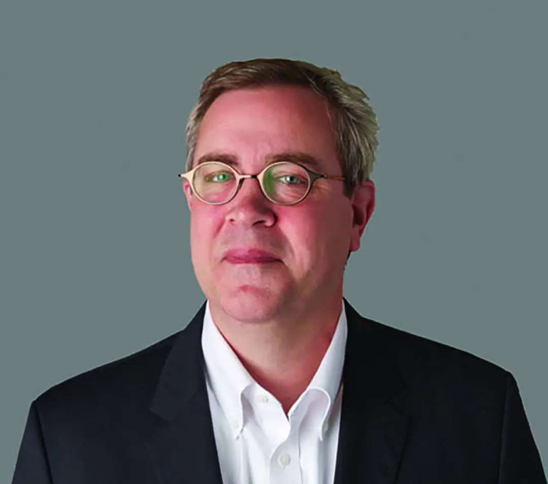 A headshot of Paul Mellblom