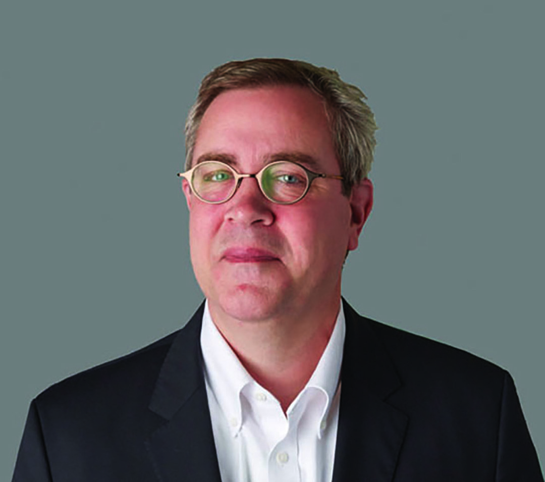 A headshot of Paul Mellblom